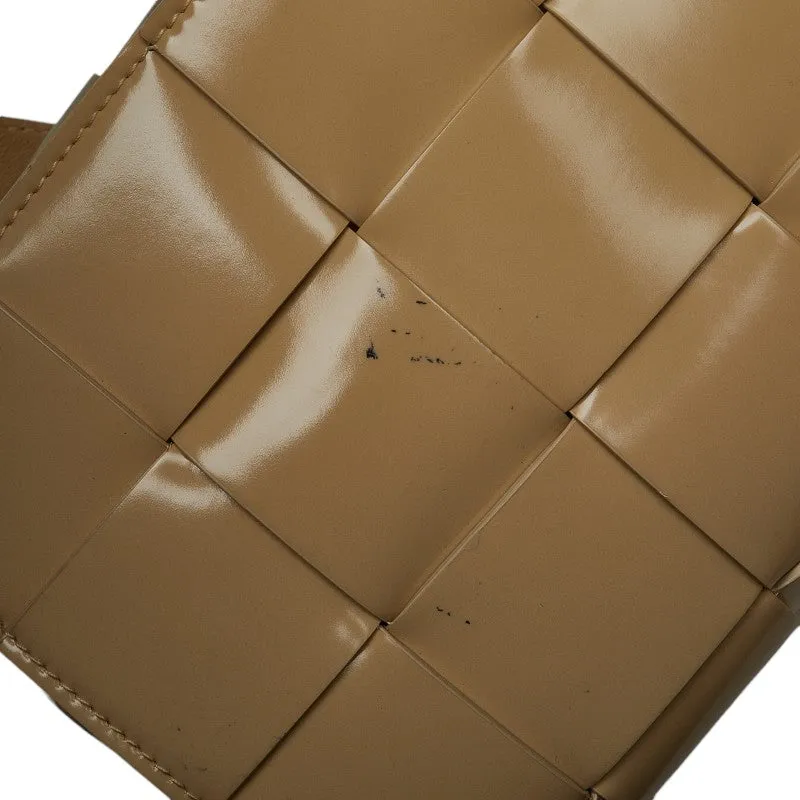 Bottega Veneta Patent Leather Cassette Crossbody Bag Beige